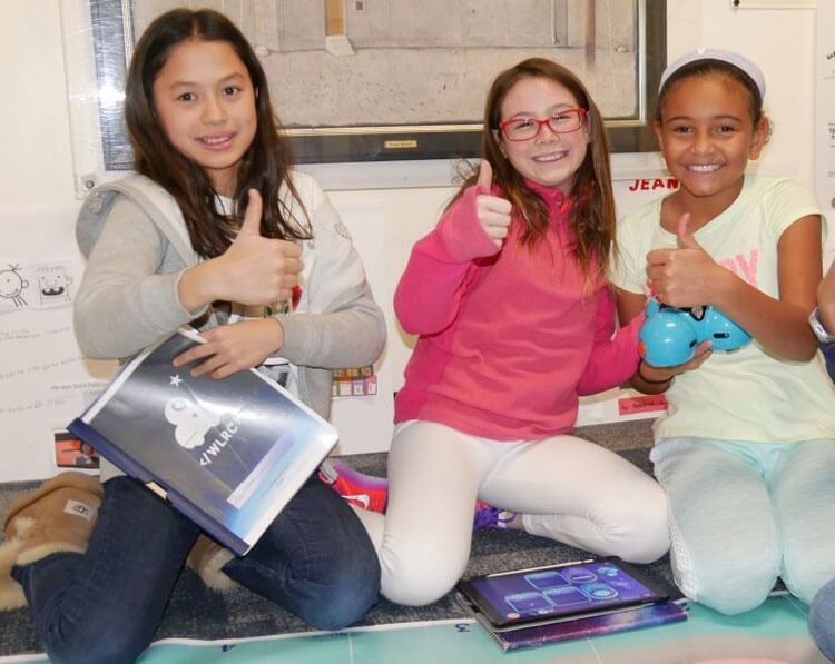 Fifth grade girls team prepares to compete at Wonder League Robotics.