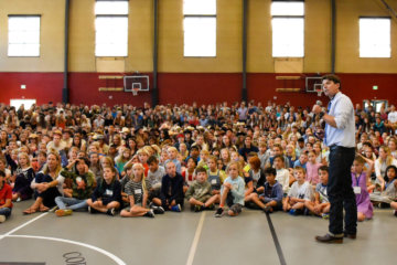 Dr. Mike Davis welcomes all students to the new school year at the Back-to-School Assembly.