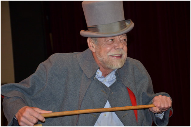 Richard Kelly plays Scrooge in the Faculty Follies.