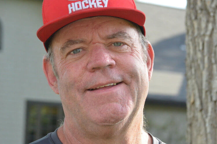 Colorado Academy ice hockey head coach Chris Delaney