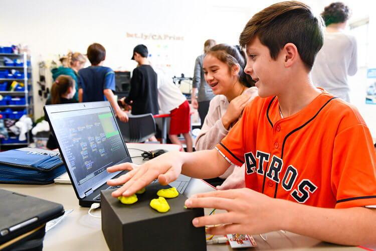 Middle School students learn coding