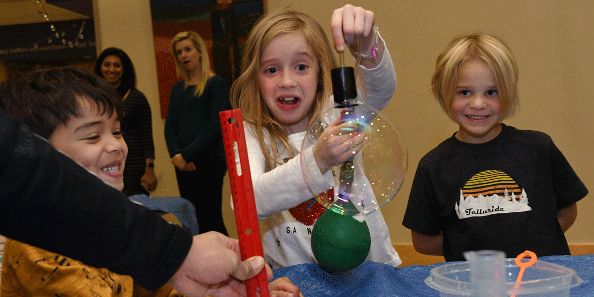 Mixing and measuring bubbles at CA's Lower School STEAM night