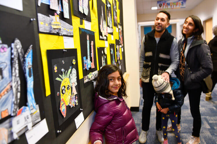 Nilaya Majmudar and her family enjoyed art displayed in the Lower School.
