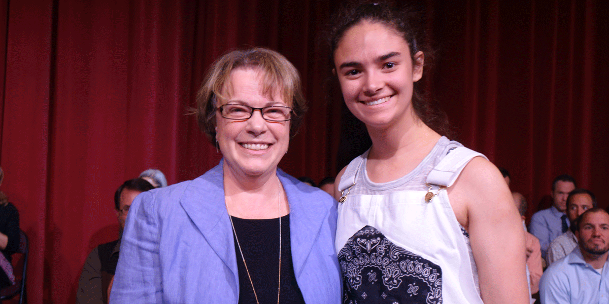 Dr. Brigitte Debord presented the Peggycita Award to Caroline Koclanes