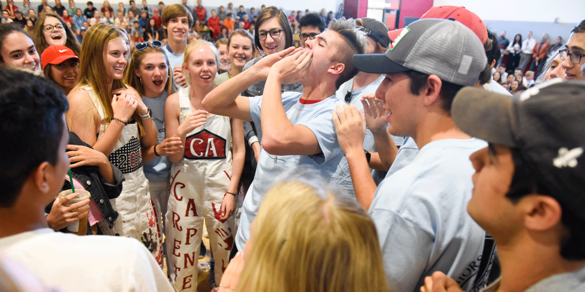 Seniors celebrate the end of their CA career with the traditional announcing of graduate names and Senior cheer.