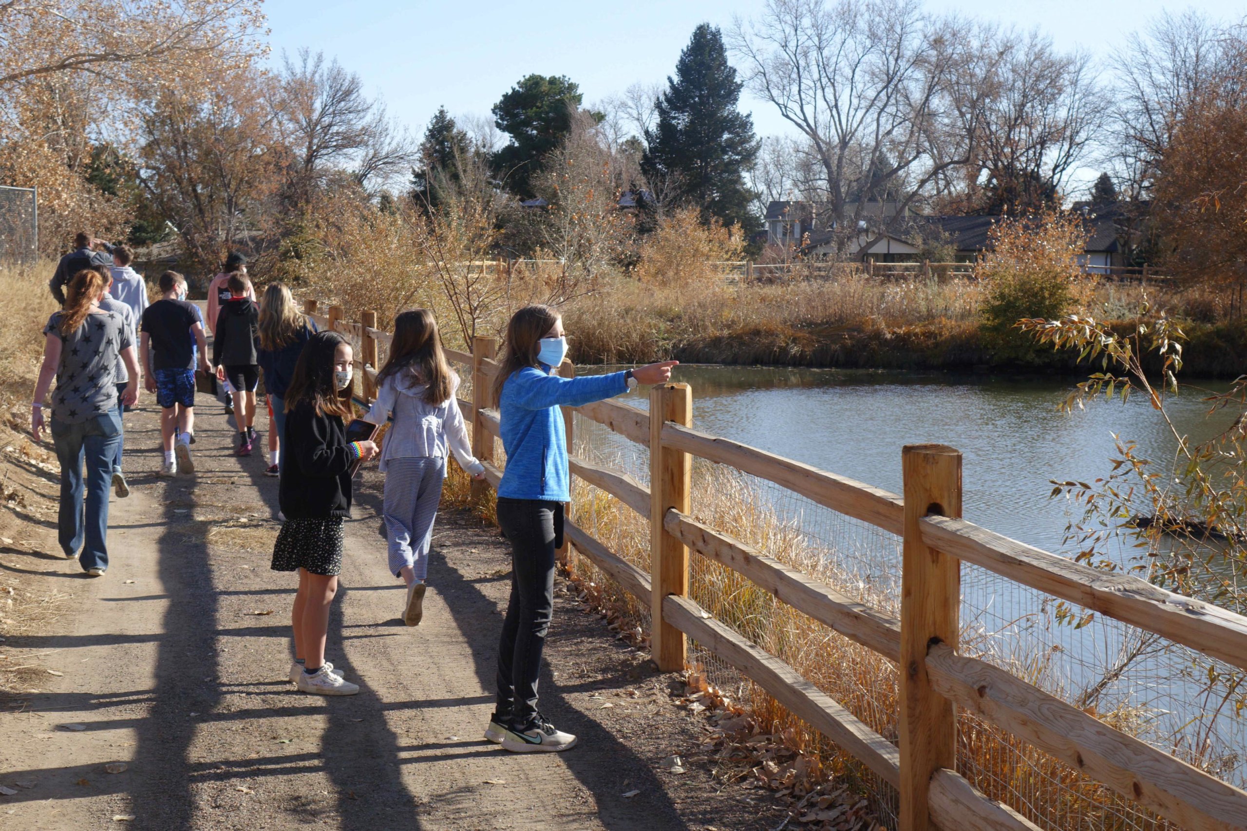 Middle School advisories visit Woodys Pond to look for birds.